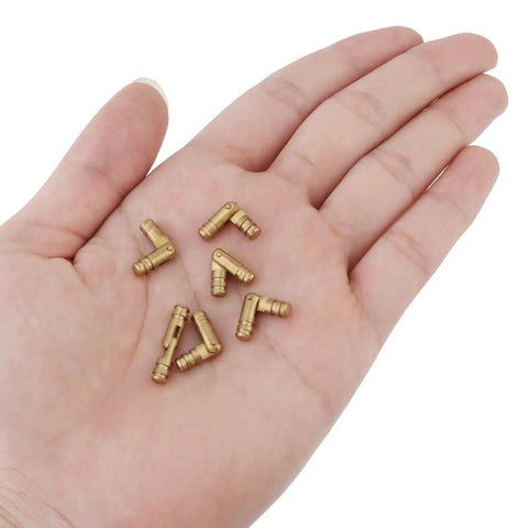 24 Pack Of 4 Millimeter Polished Brass Miniature Barrel Hinges Featuring Hidden Magnetic Closure And Included Depth Stop Drill Bit For Fine Woodwork And Models Straight Up Solid on a hand