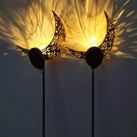 2 Pack Solar Moon Lights With Crackle Glass Globes In Antique Brass Finish On Durable Metal Stakes casting warm glow