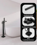 Freestanding Matte Black Bathtub Faucet With Waterfall Spout And Hand Shower Floor Mounted Brass Tub Filler For Modern Bathrooms Durable Brass Construction For Long Lasting Performance And Sleek Minimalist Look standing next to a bathtub with detail views of shower head, handle, and base.