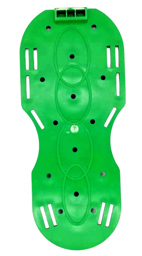 Green base of 6.8 Cm Lawn Aerator Spike Shoes With Heavy Duty Buckles And Four Adjustable Straps showing holes and design pattern
