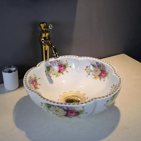 Decorative floral porcelain vessel sink with smooth glaze on bathroom vanity; not the Green Flower Round Vessel Sink.