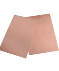 Two single-sided copper clad boards from Five Pack Single Sided FR4 Copper Clad Laminate PCB Kit 7 By 10 Cm Laminate Circuit Boards.