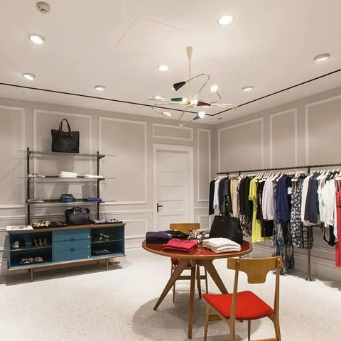 Top Shelf Led Recessed Downlight With 360 Rotation Adjustable Color Temperature Smooth Install For Bedrooms Bright Vibes Energy Saving Chrome Housing Ceiling Spotlight illuminating a stylish retail space.