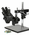 SM-4TZ-B 90X Trinocular Stereo Zoom Microscope With Double Arm Stand 3.5X To 90X Zoom black on base, shown with circuit board