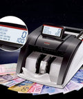 Top Tier Portable Money Counter With Legit Counterfeit Checker And Smooth Tilting Screen For All Major Bills, compact design with digital display.