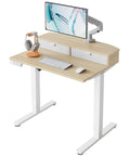 Compact Electric Standing Desk With Two Drawers 32x21 Inch Workstation C Clamp Mount Compatible Height Adjustable Sit Stand Desk Four Memory Height Settings Light Walnut Finish For Home Office with keyboard and monitor