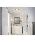 Ceiling Exhaust Vent With Light For Bathrooms And Home, 100-Watt Bright Lighting installed in a modern bathroom, white finish