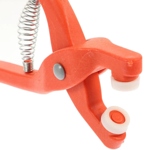 Snap Button Installation Tool Kit With Storage Box For Press Fasteners, Pro-Grade Five-Claw Snap Plier Set With Open-Ring Snaps, close-up orange plastic snap plier with spring and white die