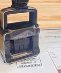 Built Like A Tank Custom Date Stamp With Personalized Text Dead Simple Self Inking Office Supplies on printed document.