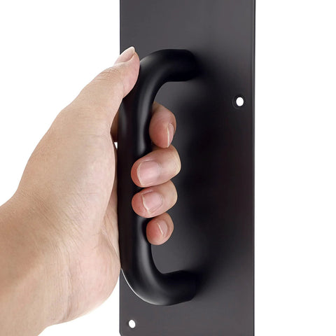 Hand gripping one of two sets 12 inch stainless steel door handles with rust resistant durable black finish, ideal for home office doors.
