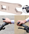 Totally Dead Nuts Precise 8mm Cycling Disc Brake Wrench And Cable Adjuster Tool Hella Reliable Hexagon Design shown above with grip in use.