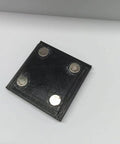 Black square magnetic hold down with four silver magnets, part of the 4 Piece Magnetic Hold Downs For Laser Engravers Rock Solid Magnetic Clamps