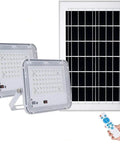 Heavy Duty Double Head Solar Flood Lighting With Remote And IP67 Waterproof Shield, two LED lights and solar panel.