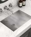 18 By 12 Inch Rectangular Stainless Steel Bathroom Sink 16 Gauge Undermount With Brushed Finish Arc-Shape Bowl installed on counter
