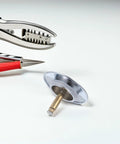 Copper Bathtub Drain Stopper with Rotary One Press Sealing with pliers for installation on a white background.