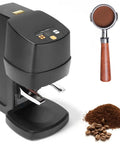 Automatic Espresso Tamper With 58mm Electric Motor And Adjustable Pressure Kills The Guesswork On Fresh Shots Every Day next to coffee grounds.