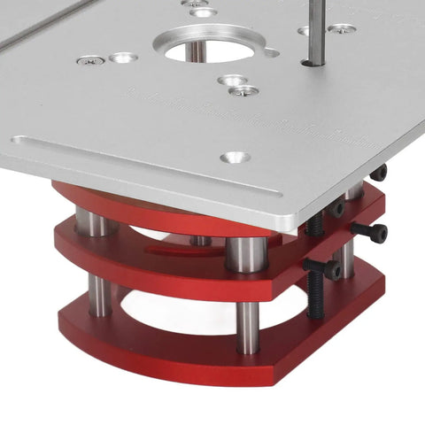 Close-up of Premium Heavy Aluminum Router Table Insert Plate Featuring Manual Crank Height Lift System with red steel mount.