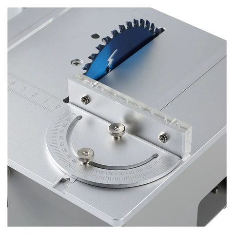 Ultra Compact Mini Electric Table Saw With Slick Angle Guide And Quick Lift Blade For Clean Wood Cuts Portable Workbench Tool close-up of angle guide and 110mm blade.