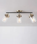Vintage Vibe Three-Light Track Lighting Bar With Pivoting Heads in Matte Black and Antique Brass Finish, Clear Glass Shades