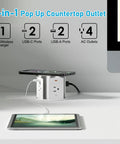 Slick Flush Mount Pop Up Socket Drops Straight Into Countertops Featuring Qi2 Magnetic Wireless Charger With 65W Fast Charging Double Usb Ports Zero Hassle Setup In Fresh White showing multiple ports and wireless charging.