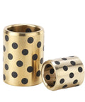 Top Shelf Brass Bushings Featuring Oil Infused Graphite Self Lubricating Design Copper Sleeves for heavy duty machinery with black dots, sizes 4-10mm.