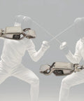 Close-up of stainless steel clips on 4 Pack Fencing Mask Cord For Foil And Sabre, fencers in action in the background.