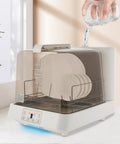 No Sweat Portable Countertop Dishwasher For Apartments And RV Cabins, compact design with plates being filled with water.