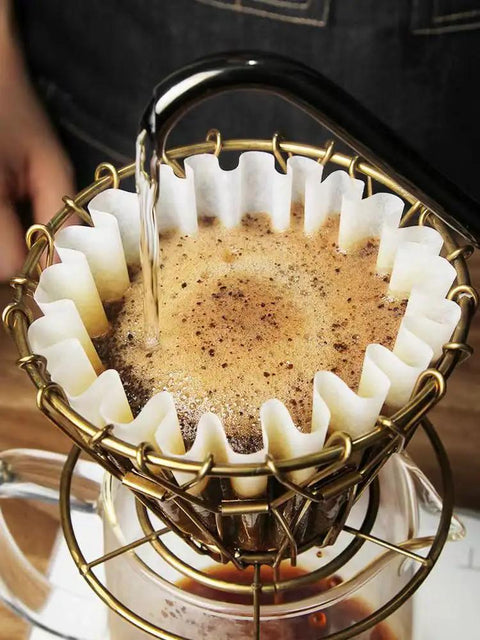 Collapsible Outdoor Pour Over Coffee Dripper in use with paper filter, ultra portable stainless steel, for hiking camping travel home office