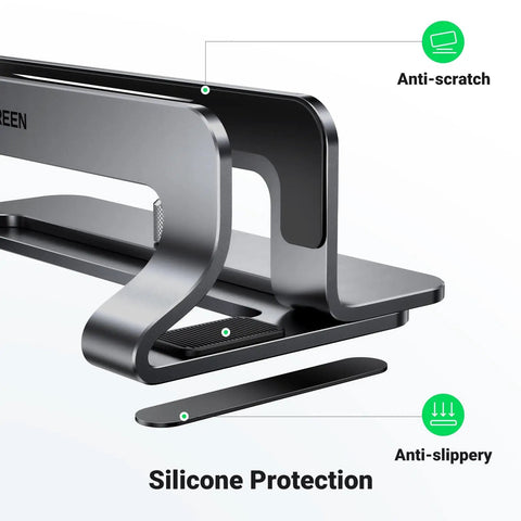 Close-up of a Vertical Laptop Stand For Desk, Aluminum Holder with anti-scratch and anti-slip features, sturdy gray dock.