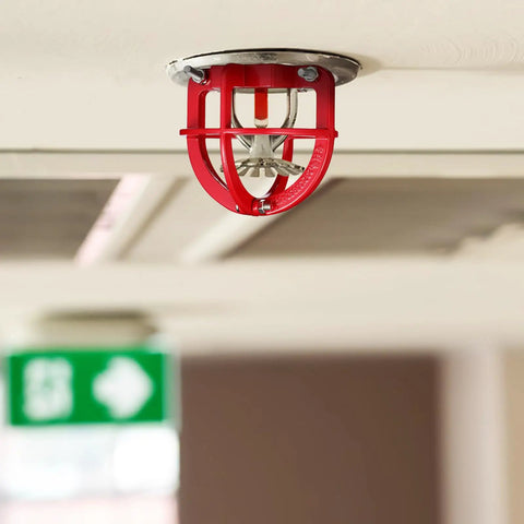 Tough As Nails Fire Sprinkler Head Guard Cover Bump Proof Protector Cage mounted on ceiling, 3.34 inch installation, red durable design.