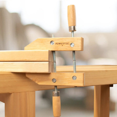 Shop Grade 12 Inch Wooden Handscrew Clamps Pair For No Sweat Woodworking And Reliable Repairs Featuring Heavy Duty Acme Screws With Stainless Spindles For A Rock Solid Secure Grip Every Single Time, close-up view on table.