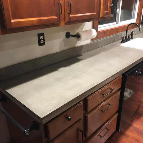 Heavy Duty Water Based Concrete Countertop Sealer Features A Smooth Matte Finish And Food Safe Formula With Low Voc And Two Component Polyurethane Shield For Hella Tough Kitchen Renovations One Kit applied to a kitchen countertop.