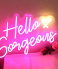 Pink LED Neon Sign Hello Gorgeous for home decor on wall, dimmable 5V neon light, lit for weddings and parties, 16.5x10.6 inches, USB powered.