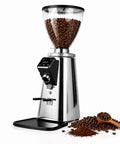 Real Deal 64Mm Stainless Steel Flat Burr Coffee Grinder With 750G Clear Hopper And Digital Display, side view with coffee beans.