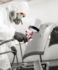 Person using Pro Grade Paint Sprayer Kit With Quick Mixing Cup And HVLP Gun, Includes 1.4 1.7 2.0 mm Nozzles for auto painting