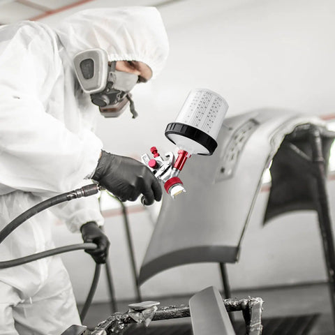 Person using Pro Grade Paint Sprayer Kit With Quick Mixing Cup And HVLP Gun, Includes 1.4 1.7 2.0 mm Nozzles for auto painting
