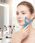 Woman using Facial Hair Epilator Spring Tool 3-Pack Painless No Fuss Root Remover for upper lip and cheeks near makeup table