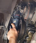 Mechanic using 1207MAX-D3 Three Eighths Inch Drive Air Ratchet Wrench on vehicle engine