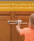 Child attempting to open cabinet with OutSmart Slide Lock Four Pack Kidproof Cabinet And Drawer Latches Easy One Hand Operation No Drilling Required Hidden Button Design White Pack Of 4 For Safer Home
