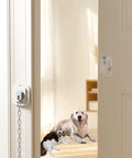 Adjustable Cat Door Stopper That Holds Entryways Wide While Keeping Pups Out Zero Drill Setup in a doorway with a chain and pets.