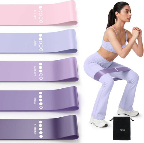 Five Band Resistance Set For Home Workouts With Five Elastic Loop Bands For Strength Training Stretching Pilates Yoga Physical Therapy And Full Body Leg Glute Arm Workouts For Women And Men with a woman using them in a squat position.