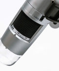 USB Digital Microscope With True 20x To 50x And 200x Optical Zoom 0.3MP 640 By 480 Image, 30 FPS Video, Measurement Tools In Inches And Millimeters, WF-20 Ready, MicroTouch For Easy Image Capture. Close-up of gray USB microscope lens with zoom scale and lock ring.