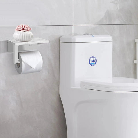 Toilet Paper Holder With Marble Shelf, Stainless Steel Wall Mount, SUS304 Construction next to a toilet in a modern bathroom.