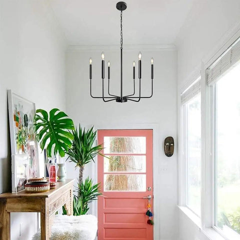 Black Farmhouse Chandelier With 6 Lights, 26.1 Inch Wide Adjustable Height Rustic Hanging Light Fixture in white entryway.