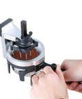Smooth Operator Rotary Coffee Stirrer Needle Tool for compacted bean clumps in espresso baskets, shown in use.