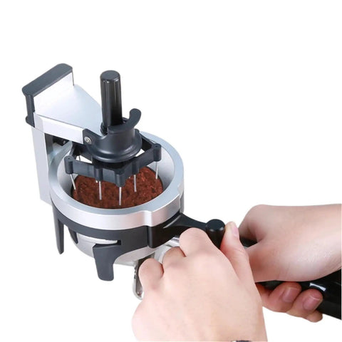 Smooth Operator Rotary Coffee Stirrer Needle Tool for compacted bean clumps in espresso baskets, shown in use.