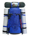 Blue huge capacity outdoor hiking backpack for mountaineering and camping with gear attached, lightweight waterproof build.