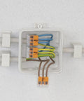 Junction box with Lever Nut 5 Conductor Compact Connectors 221-415 connecting copper wires, showcasing visual strip check feature
