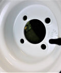 Close-up of 8x7 white wheel rim from 18x8.50-8 Golf Cart Tires On 8x7 White Wheels Assemblies Set Of 4 Universal Fit For EZGO Yamaha Club Car.