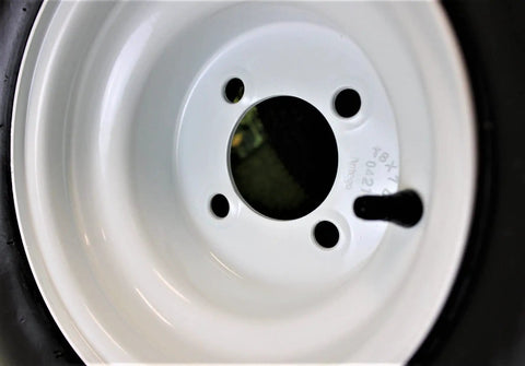 Close-up of 8x7 white wheel rim from 18x8.50-8 Golf Cart Tires On 8x7 White Wheels Assemblies Set Of 4 Universal Fit For EZGO Yamaha Club Car.